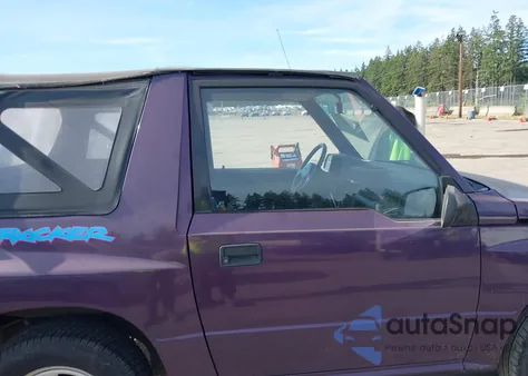 1995 Geo Tracker from USA, damaged, VIN 2CNBE18U9S6924854